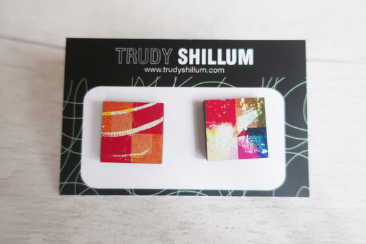 Colorful square earrings on a white card with 'Trudy Shillum' branding.