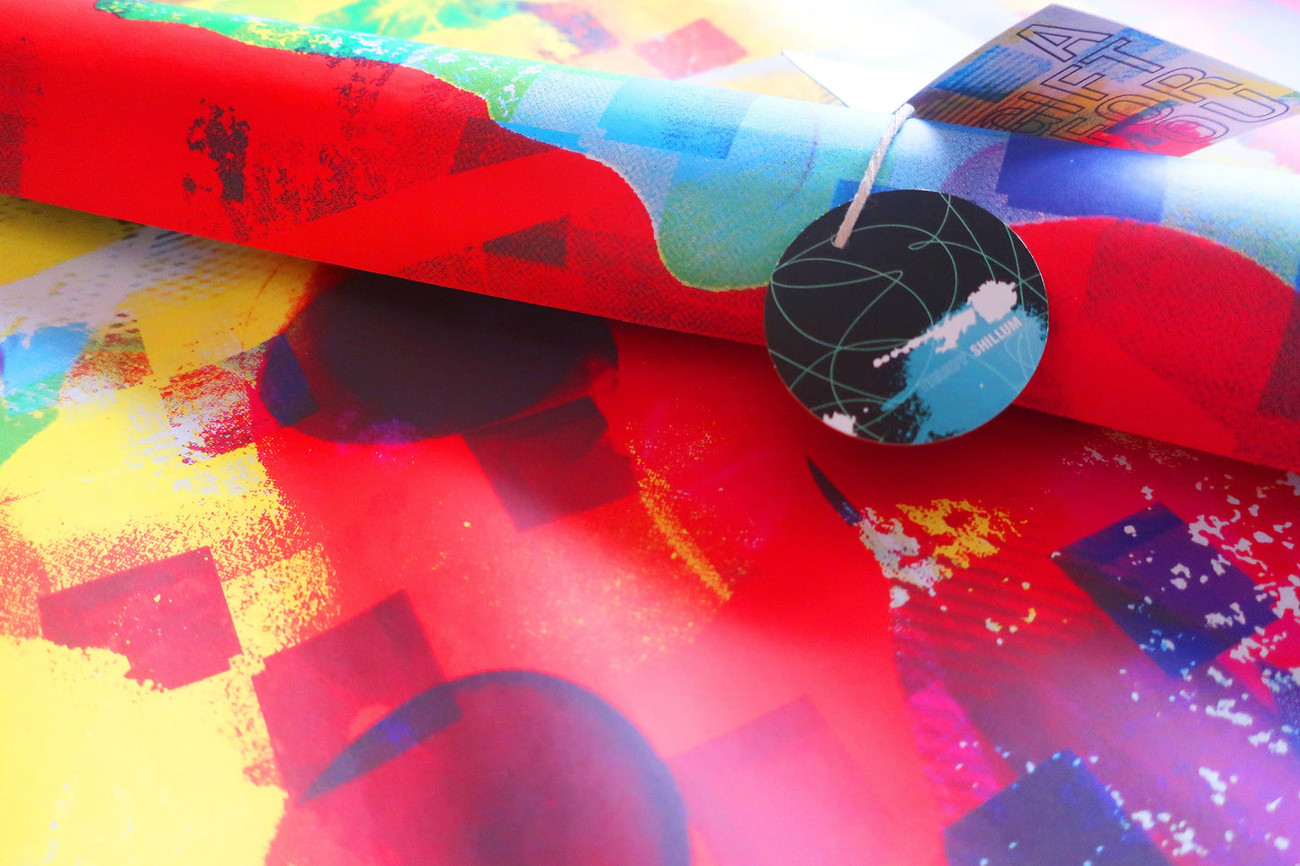 Colorful abstract paper with a circular label on top