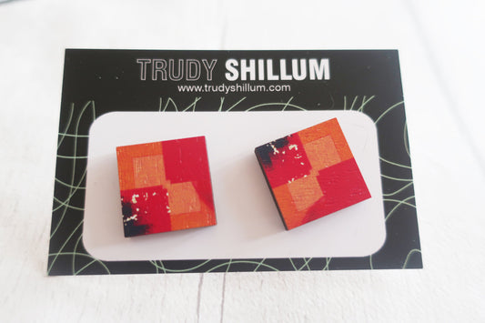Square earrings with a geometric design on a branded card with 'Trudy Shillum' branding.
