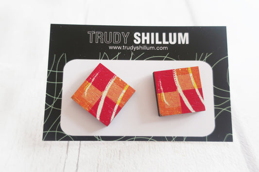 Colorful square earrings on a white card with 'Trudy Shillum' branding.