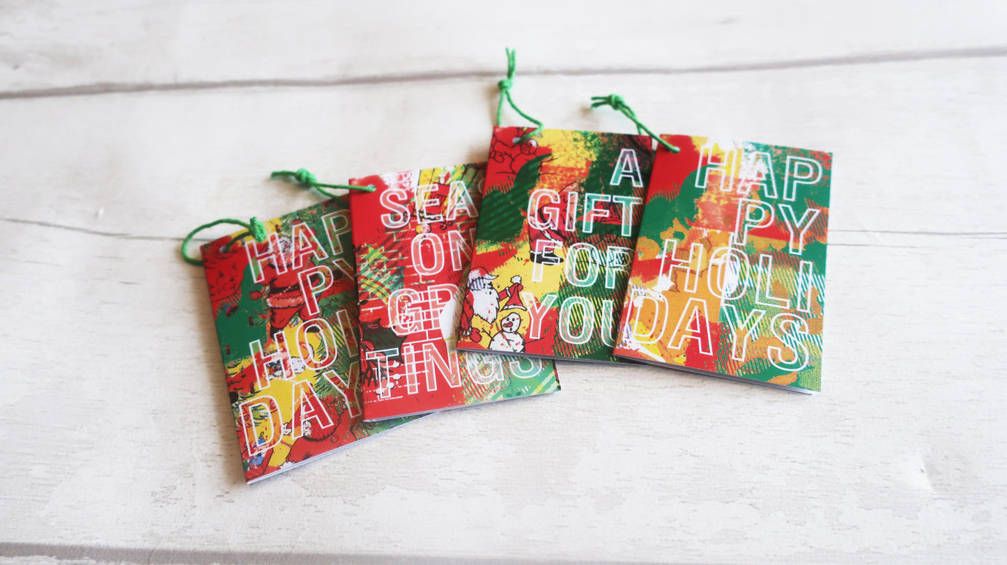 a set of 4 Christmas gift tags