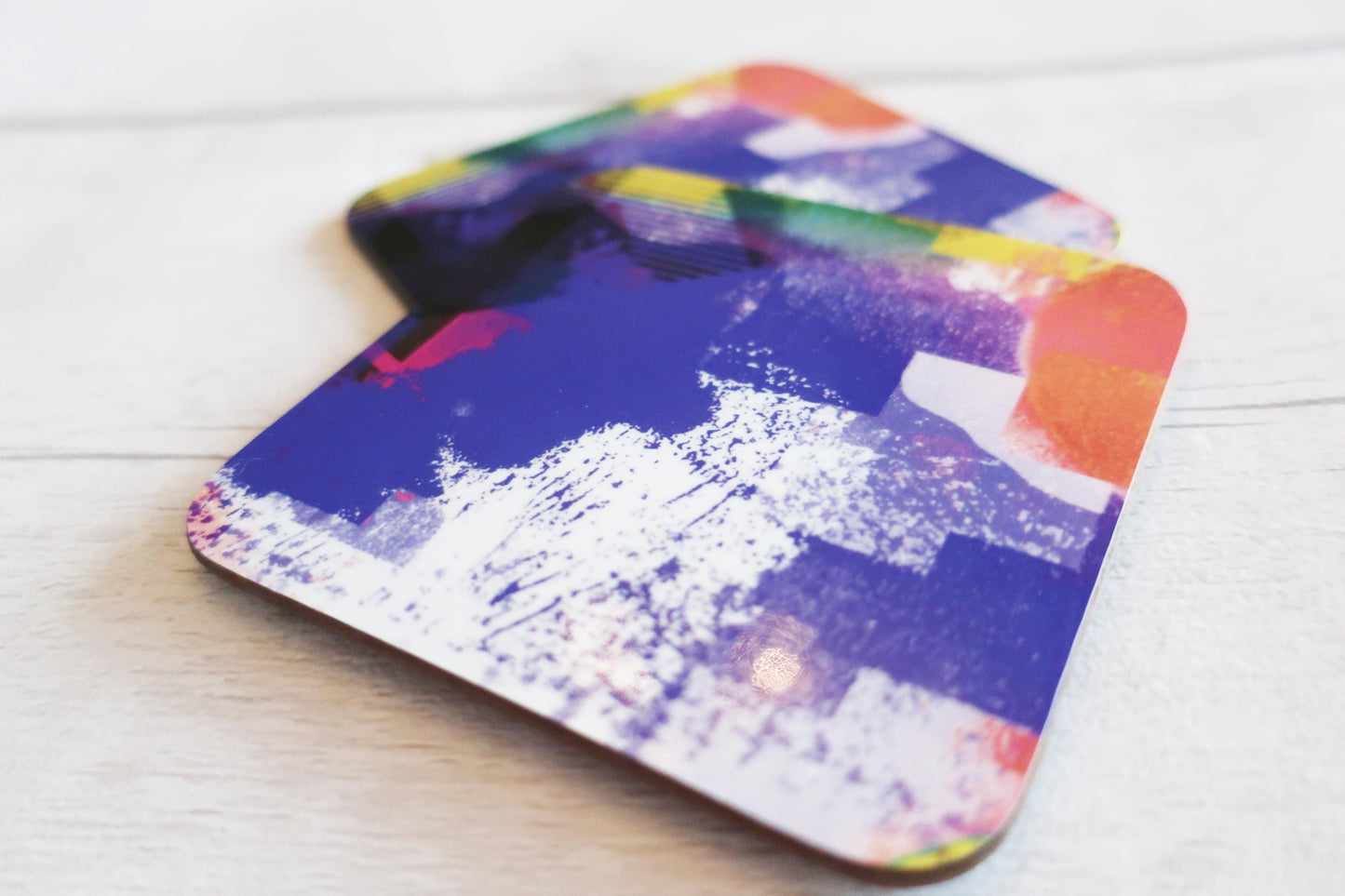Colorful abstract design on a wooden surface