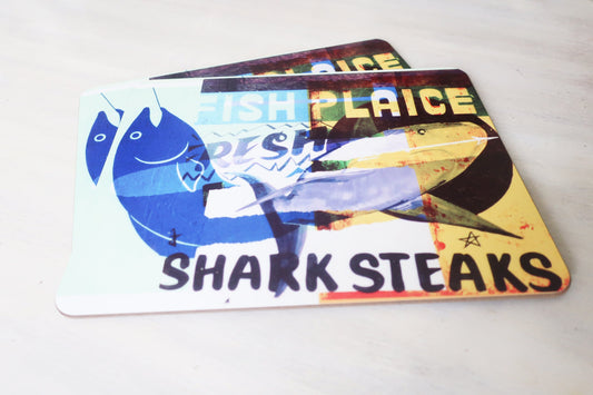 Colorful placemat with shark illustration and text on a white background