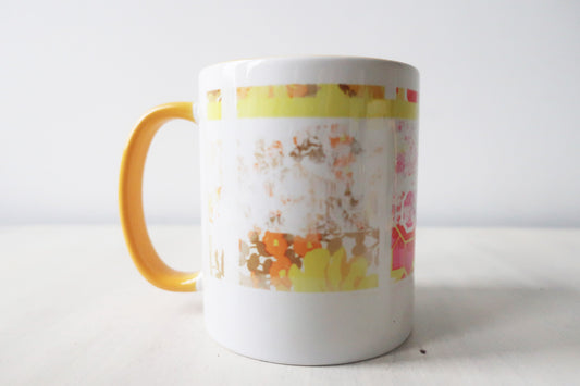 White mug with a colorful design on a white background
