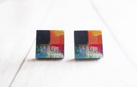 Colorful square earrings on a white background