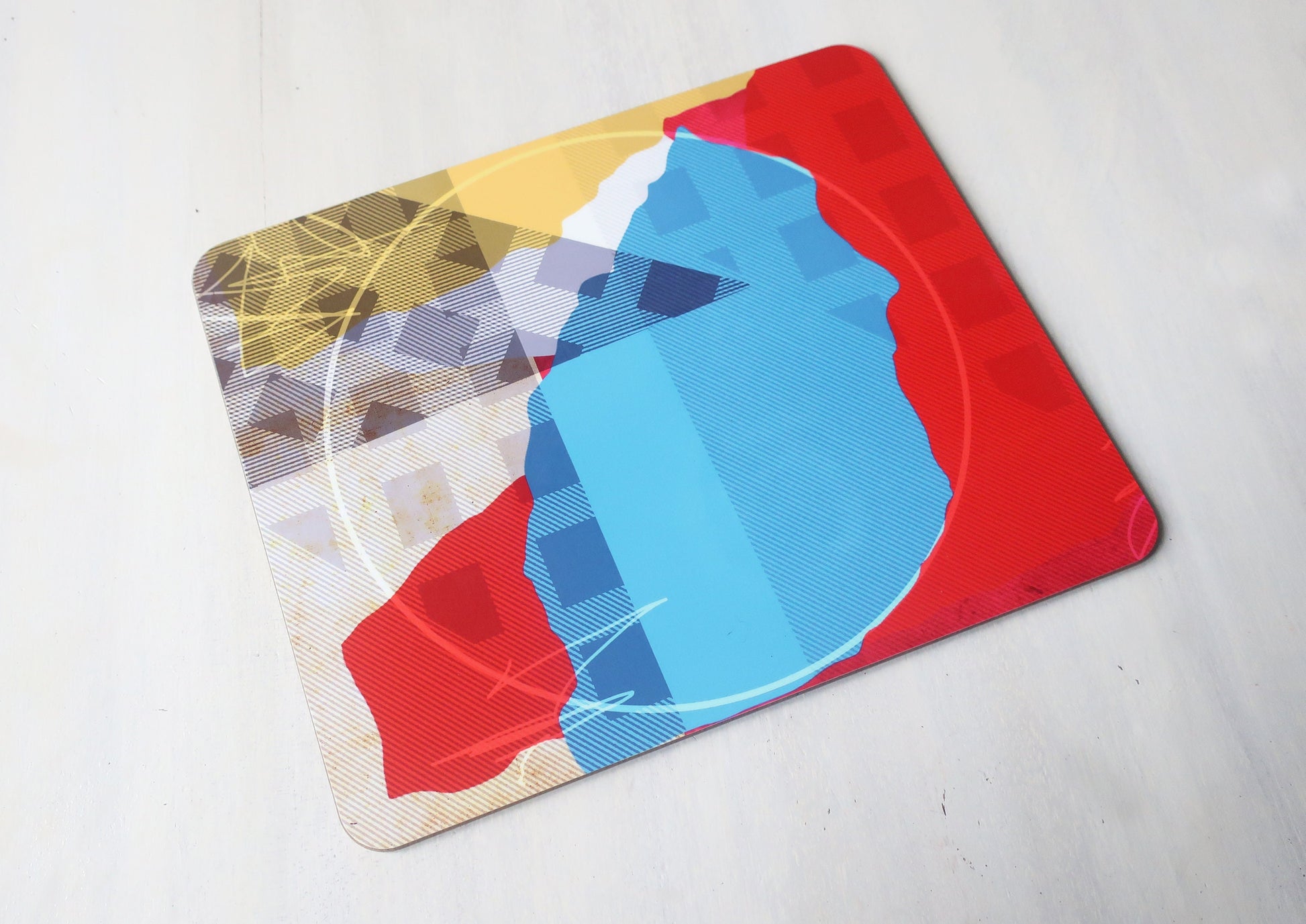 Colorful placemat  with abstract designs on a white background