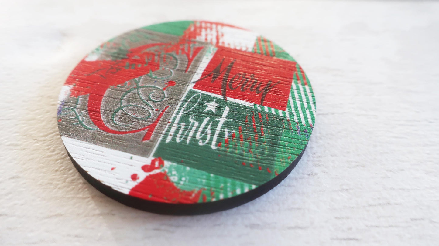 Round Christmas-themed badge  with red, green, and white design on a light gray background