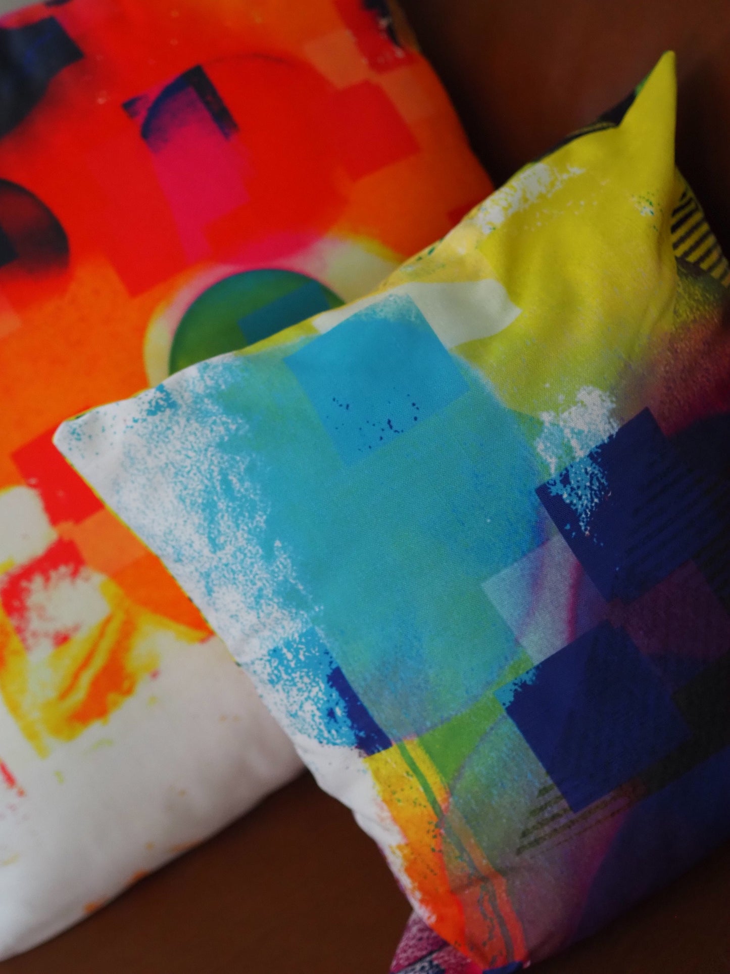 Colorful fabric with geometric pattern on a wooden surface