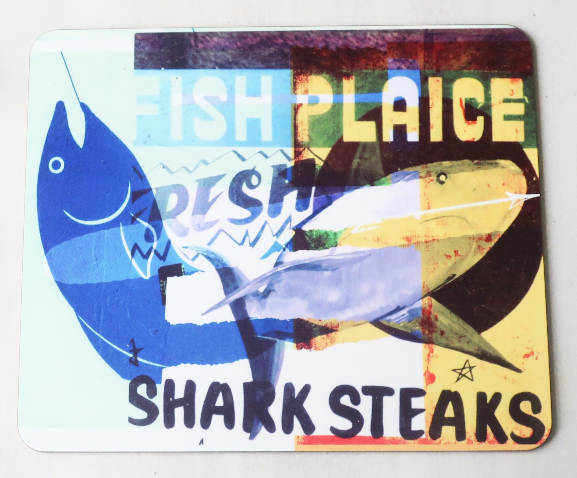 Colorful placemat with fish illustrations and text on a white background
