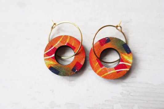 Colorful hoop earrings on a white background