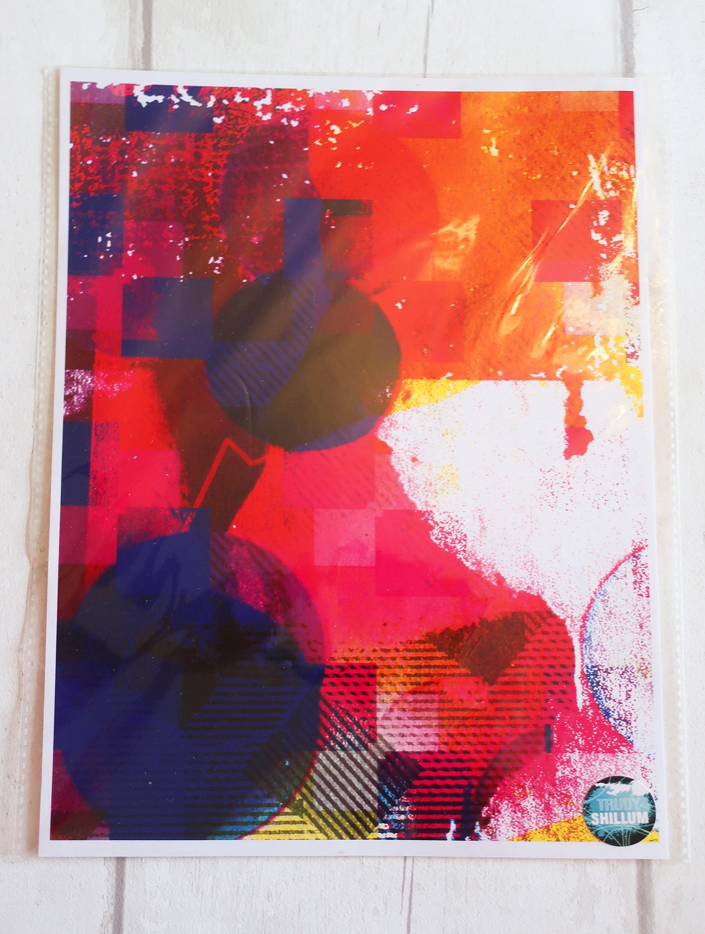 Abstract art print with vibrant colors on a white background