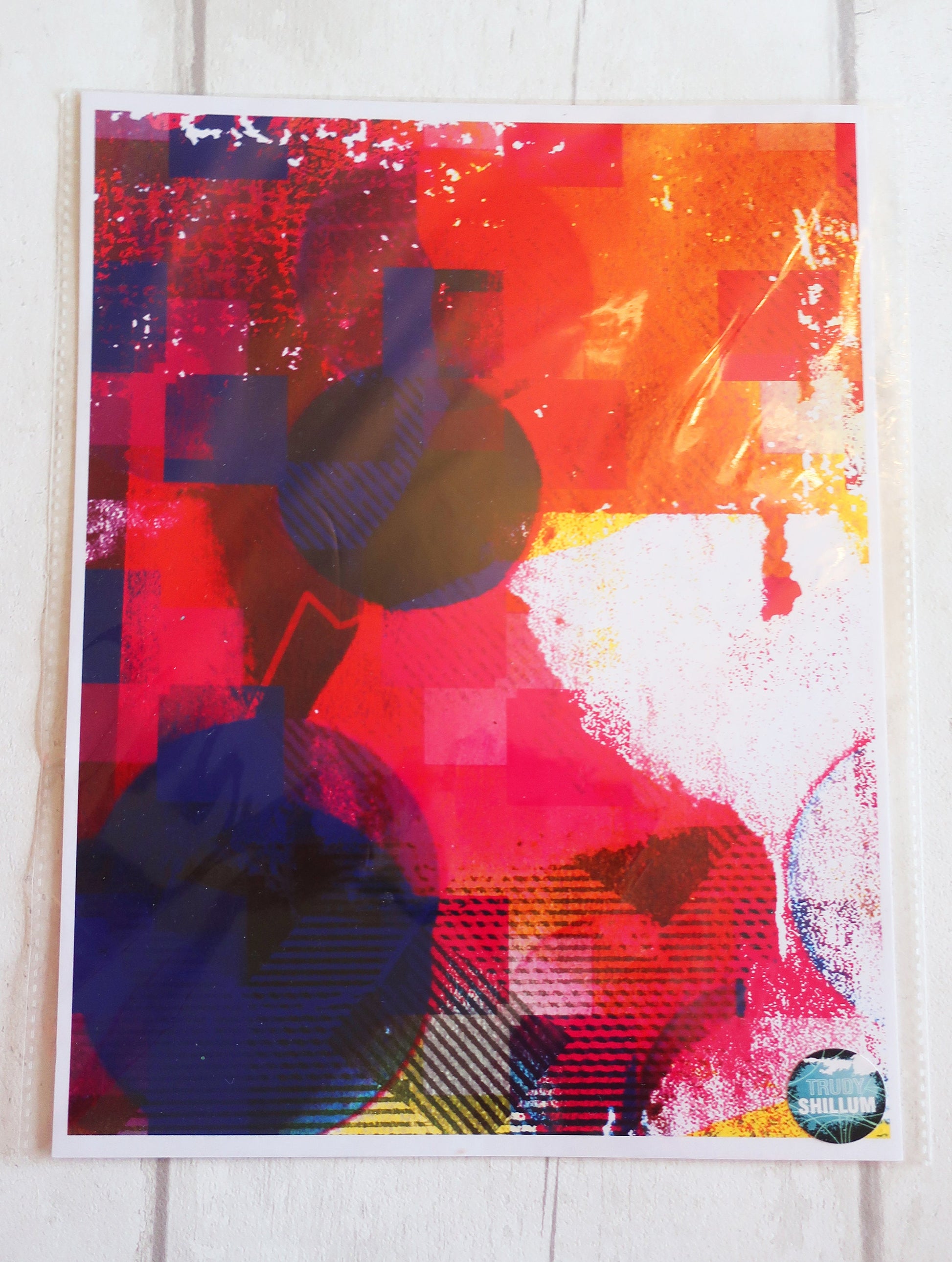 Abstract art print with vibrant colors on a white background