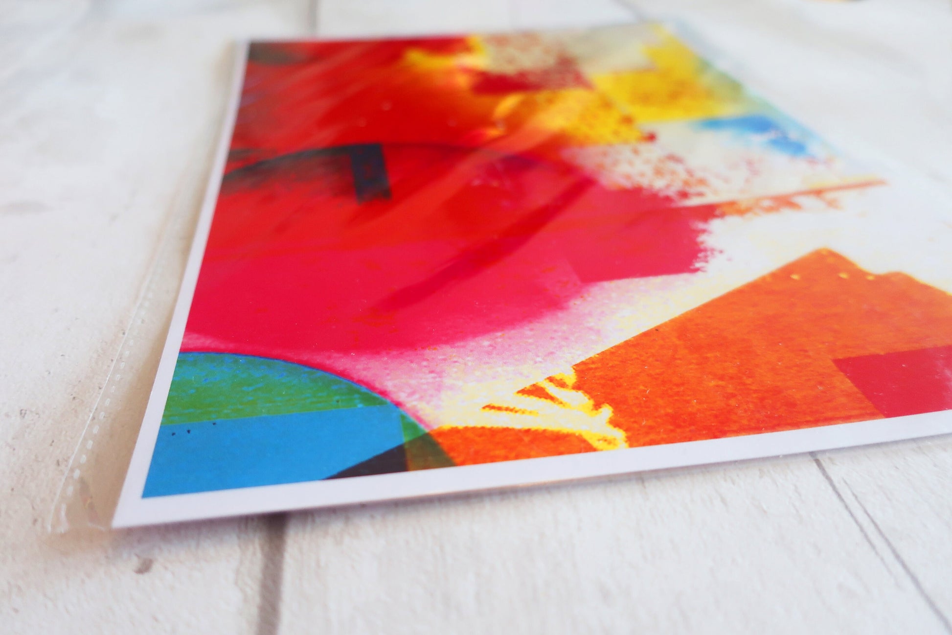Colorful abstract art print on a white surface