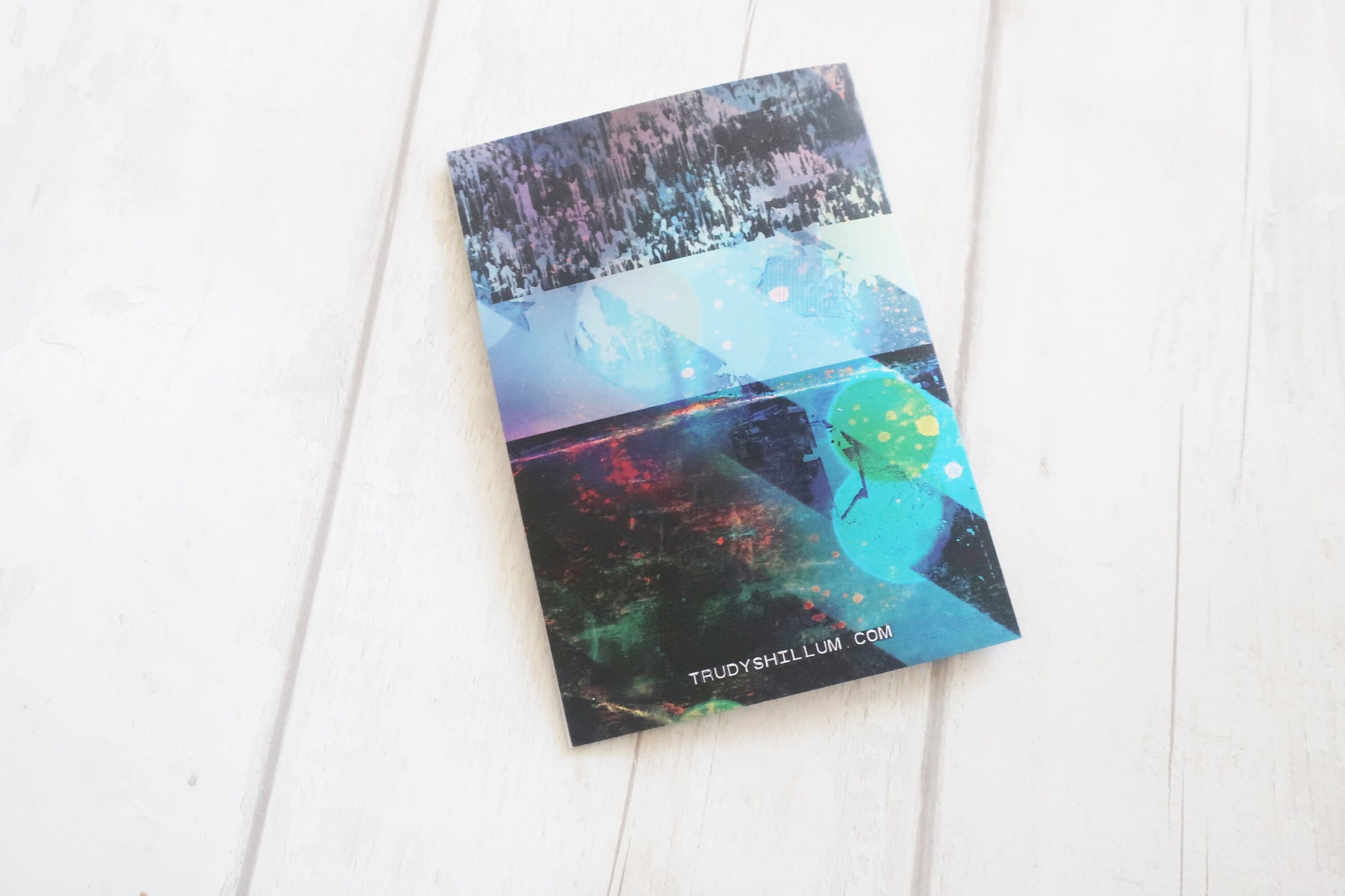card with a colorful design on a white surface