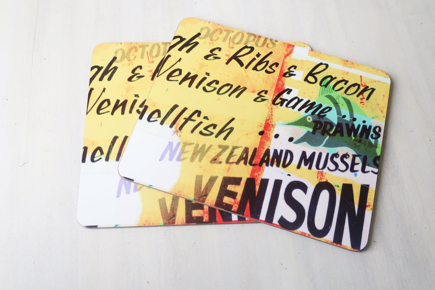 Colorful menu placemats with text on a white background