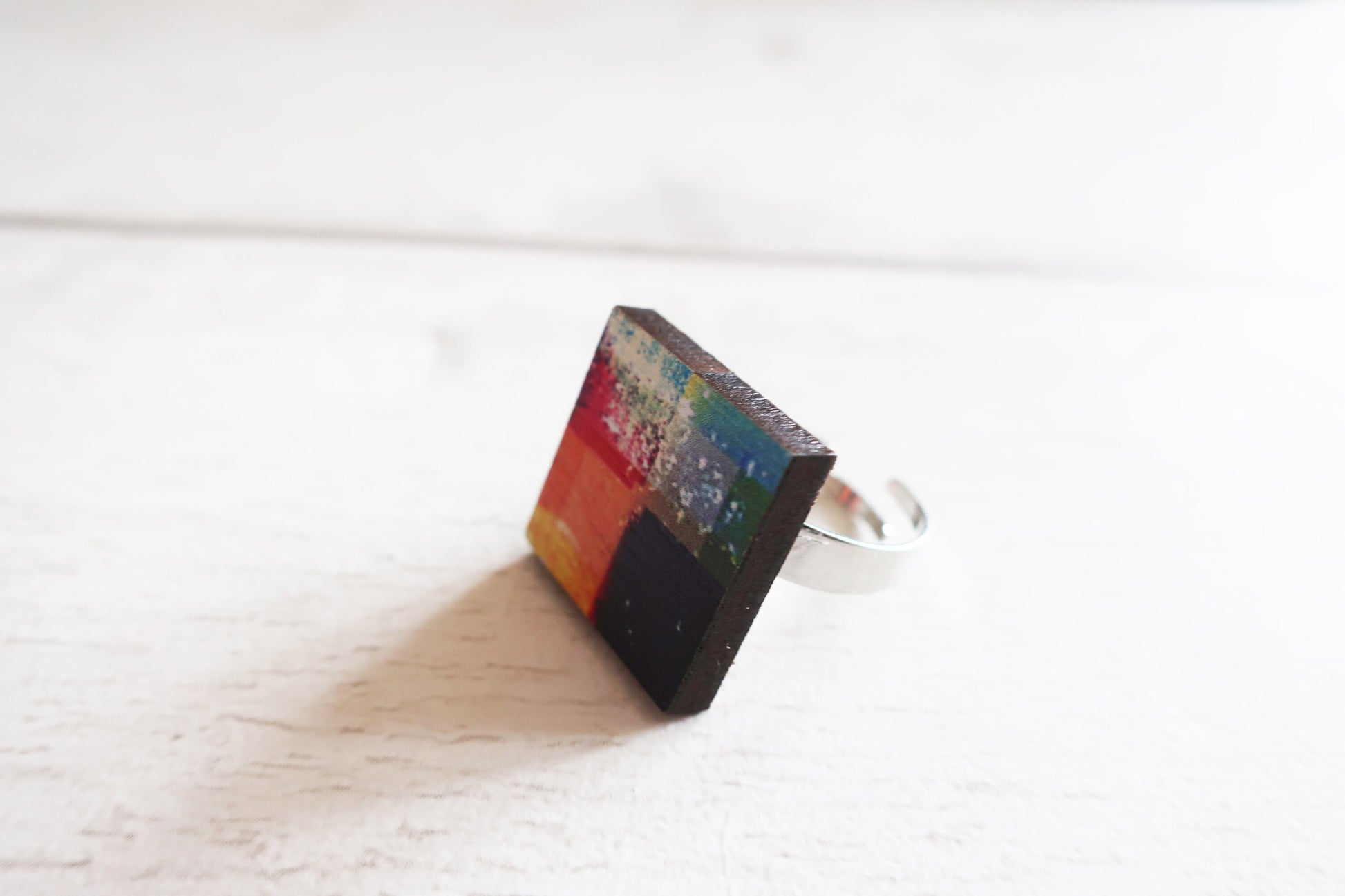Colorful square ring on a white surface