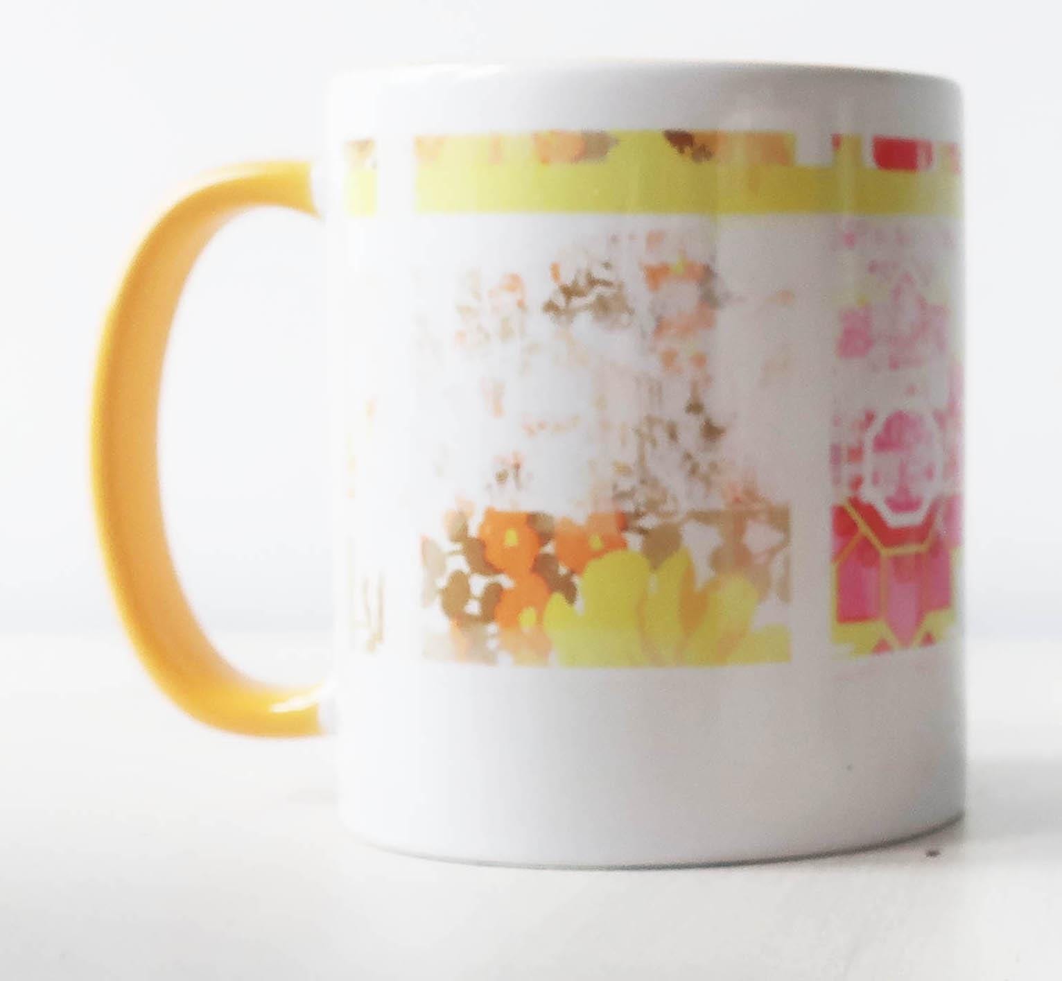 White mug with a colorful floral pattern on a white background