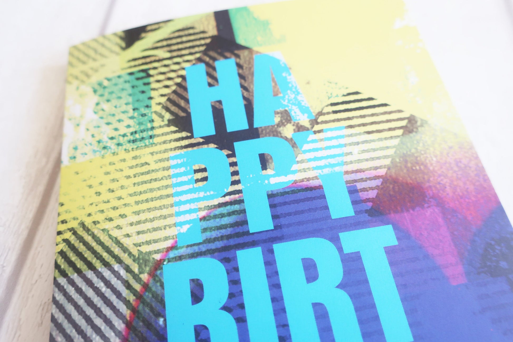 Colorful birthday card with 'Happy Birthday' text on a white background