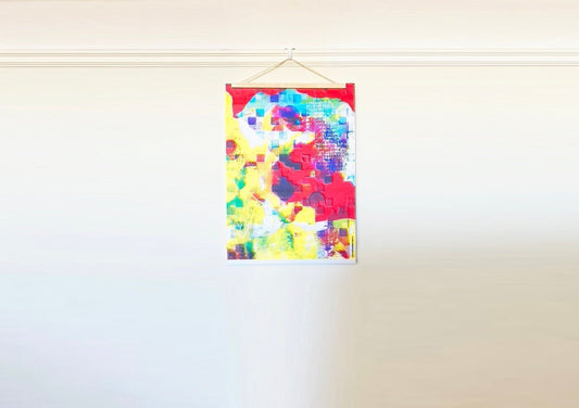 Colorful abstract painting hanging on a white wall