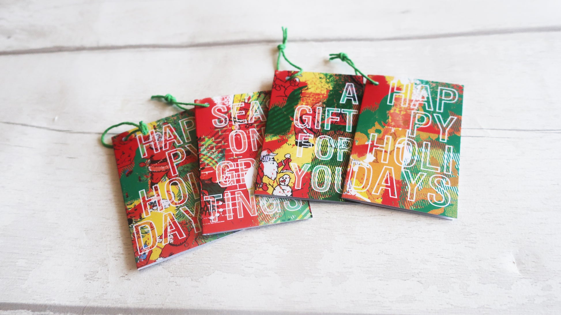 a set of 4 Christmas gift tags