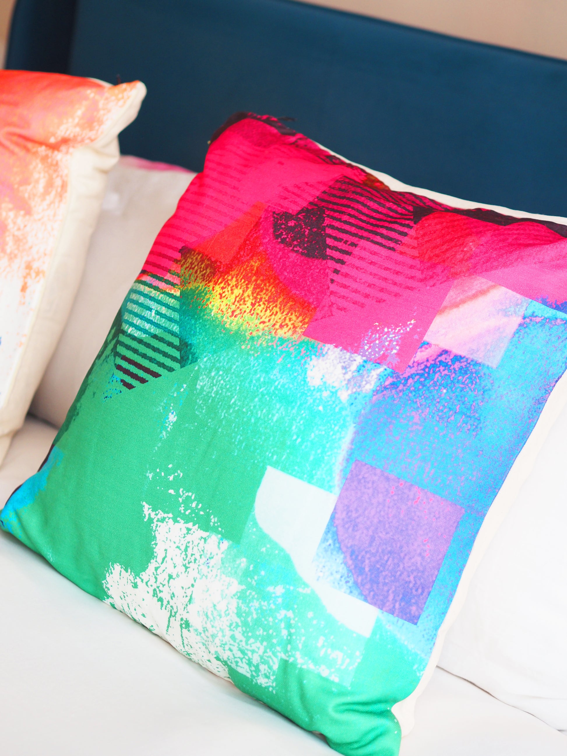 Colorful abstract pillow on a couch