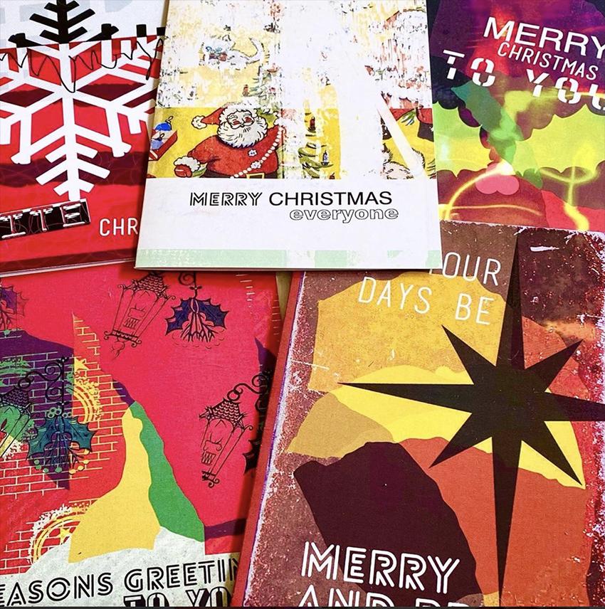 Collection of colorful Christmas cards with various designs and text.