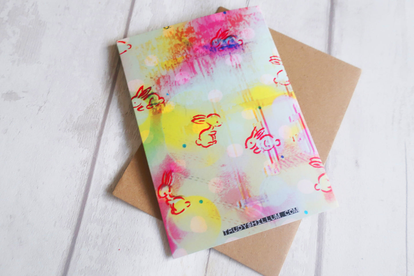 Colorful children's drawing on a white surface