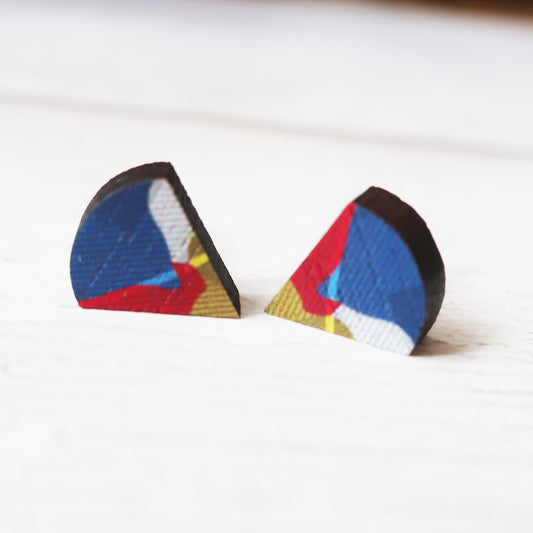 Pair of geometrically patterned earrings on a white background