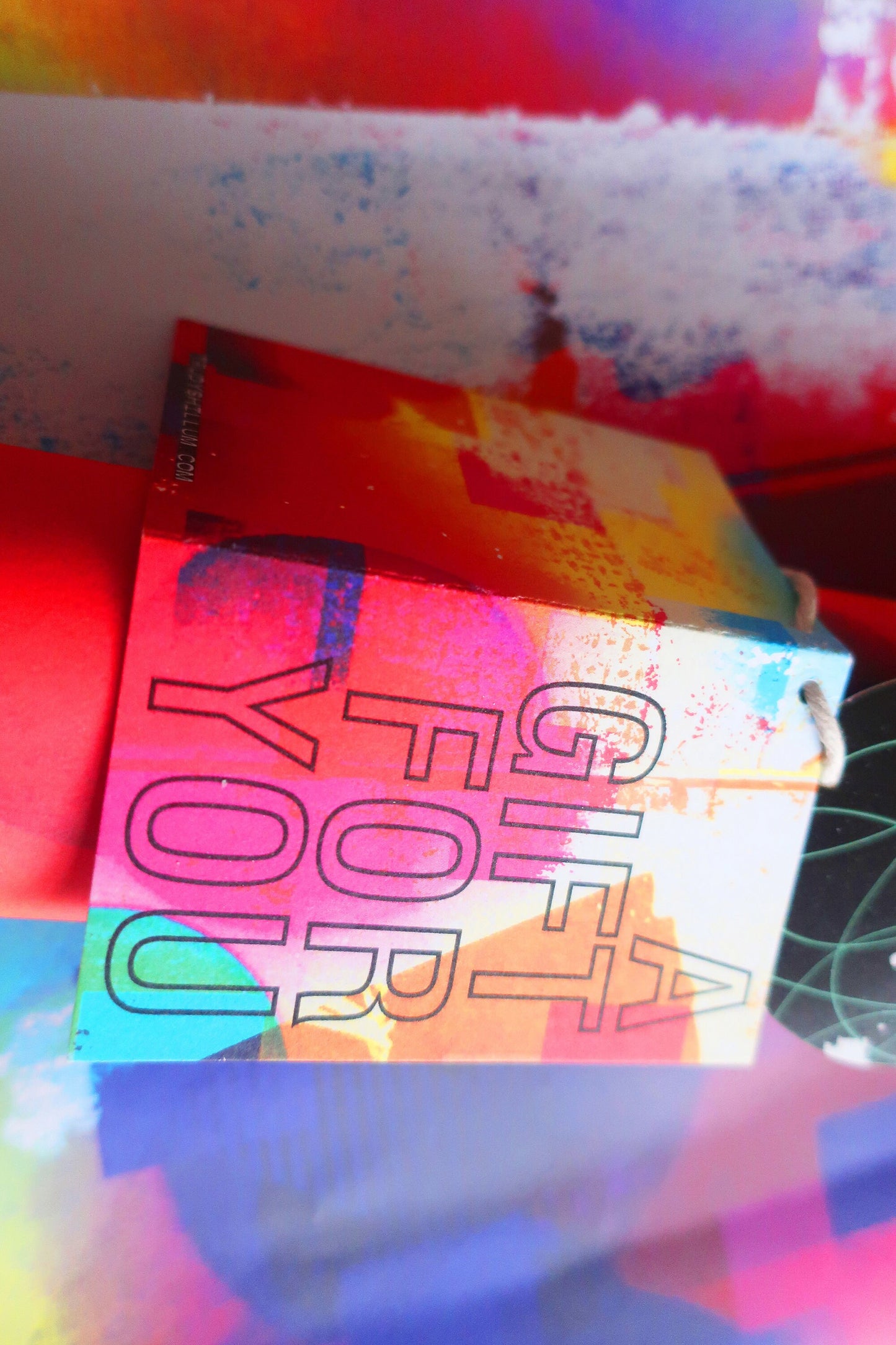 Colorful wrapping paper with label on a multicolored background