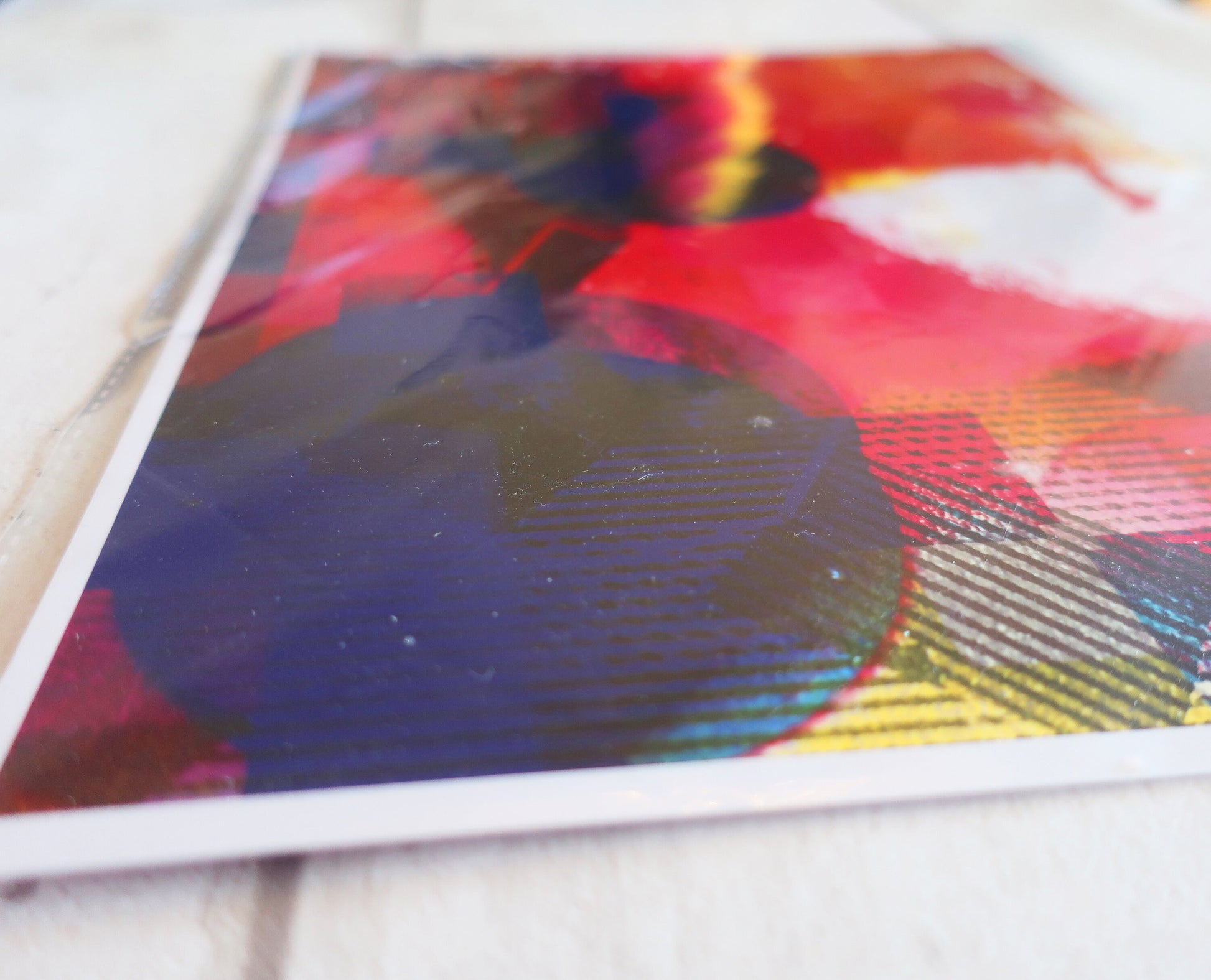 Colorful abstract A4 print  on a textured surface