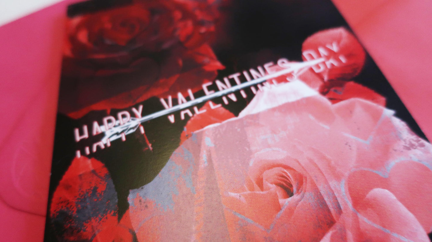 Valentine's Day card with red roses and 'Happy Valentine's Day' text.